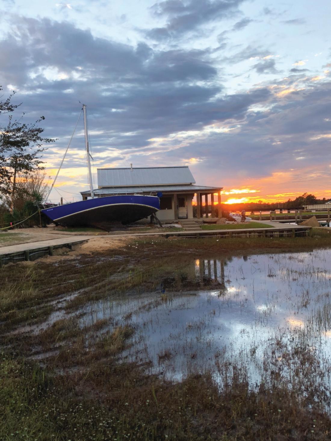 The familiar scene of abandoned boats and destroyed buildings, as seen here near the Bridgepointe Hotel and Marina in New Bern, could be seen all across the county in the days that followed Hurricane Florence. Despite the overwhelming damage that occurred, the community remained resilient and steadfast in its efforts to recover from the storm. (Photo by Meredith Laskovics)